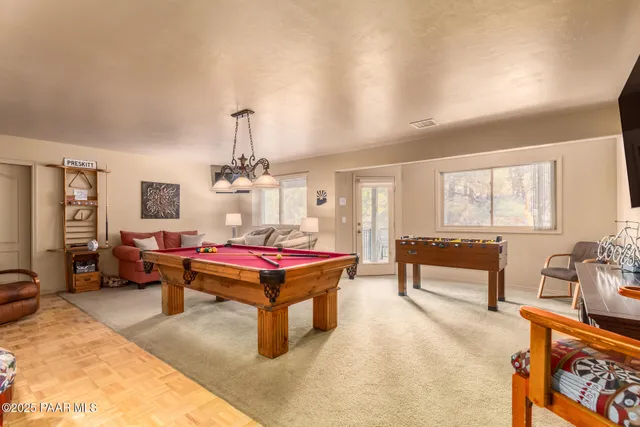 a bedroom with furniture and window