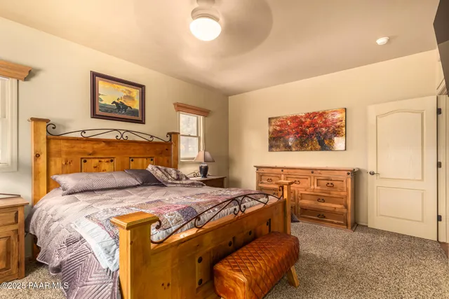 a bed room with a bed and a couch