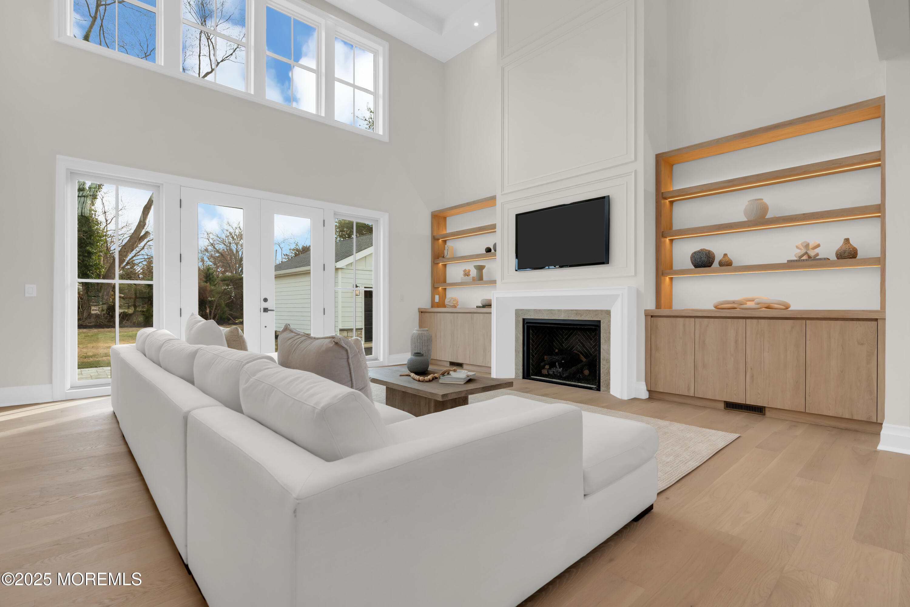 69 Winding Way Little Silver, NJ 07739 - Photo 15 of 99 a living room with furniture large window and a fireplace