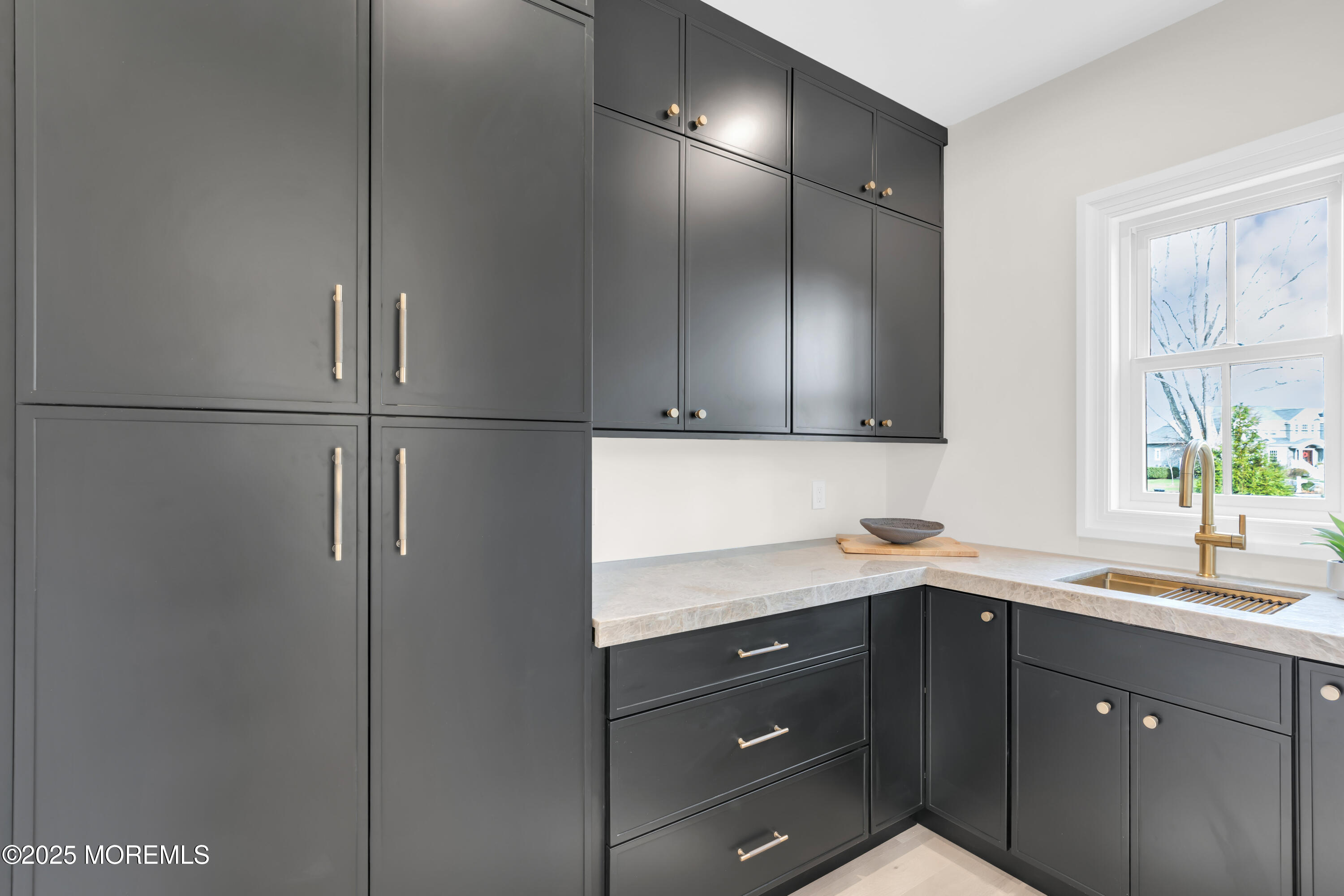 69 Winding Way Little Silver, NJ 07739 - Photo 33 of 99 a kitchen with a sink and a refrigerator