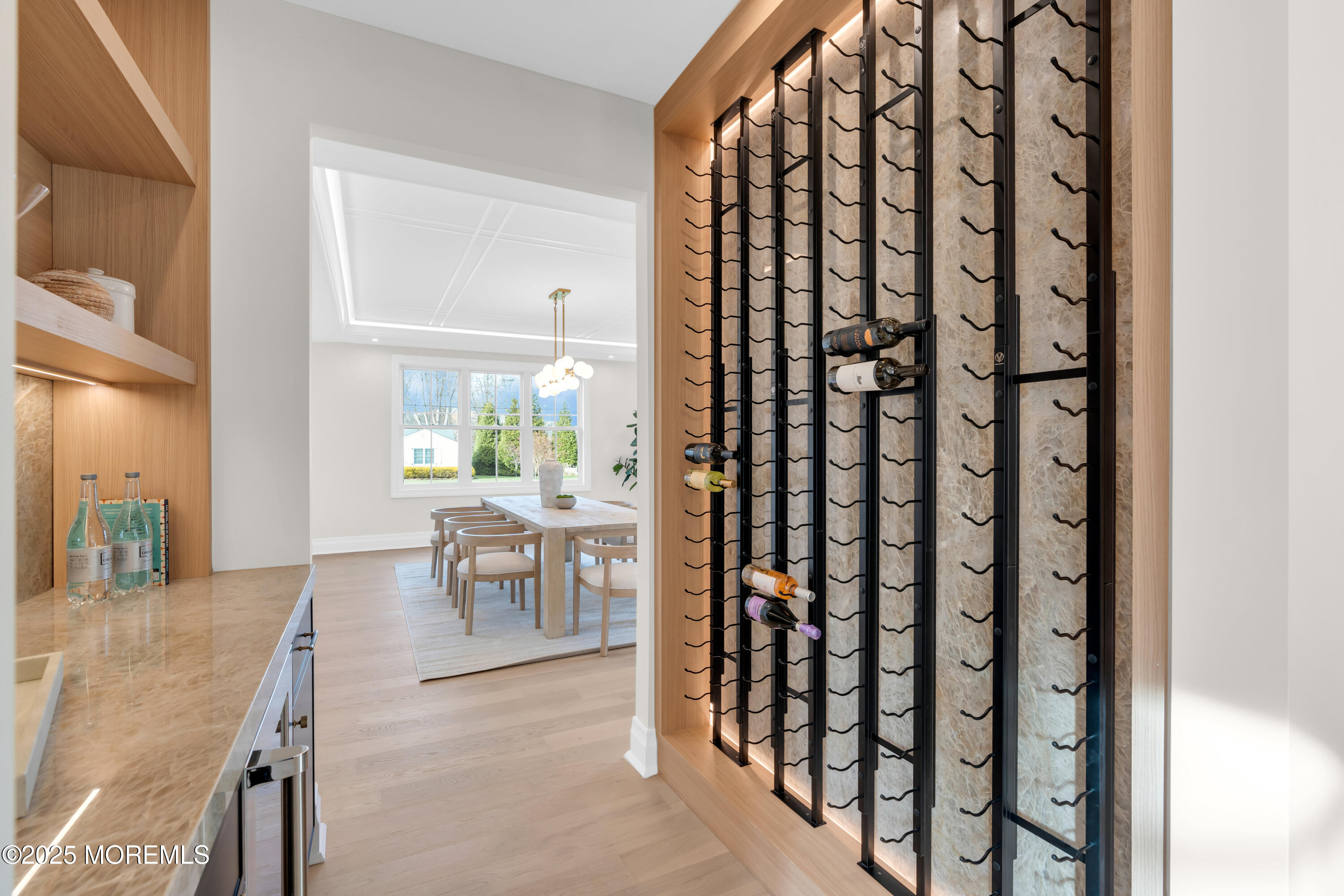 69 Winding Way Little Silver, NJ 07739 - Photo 35 of 99 a view of a hallway with wooden floor and dining room