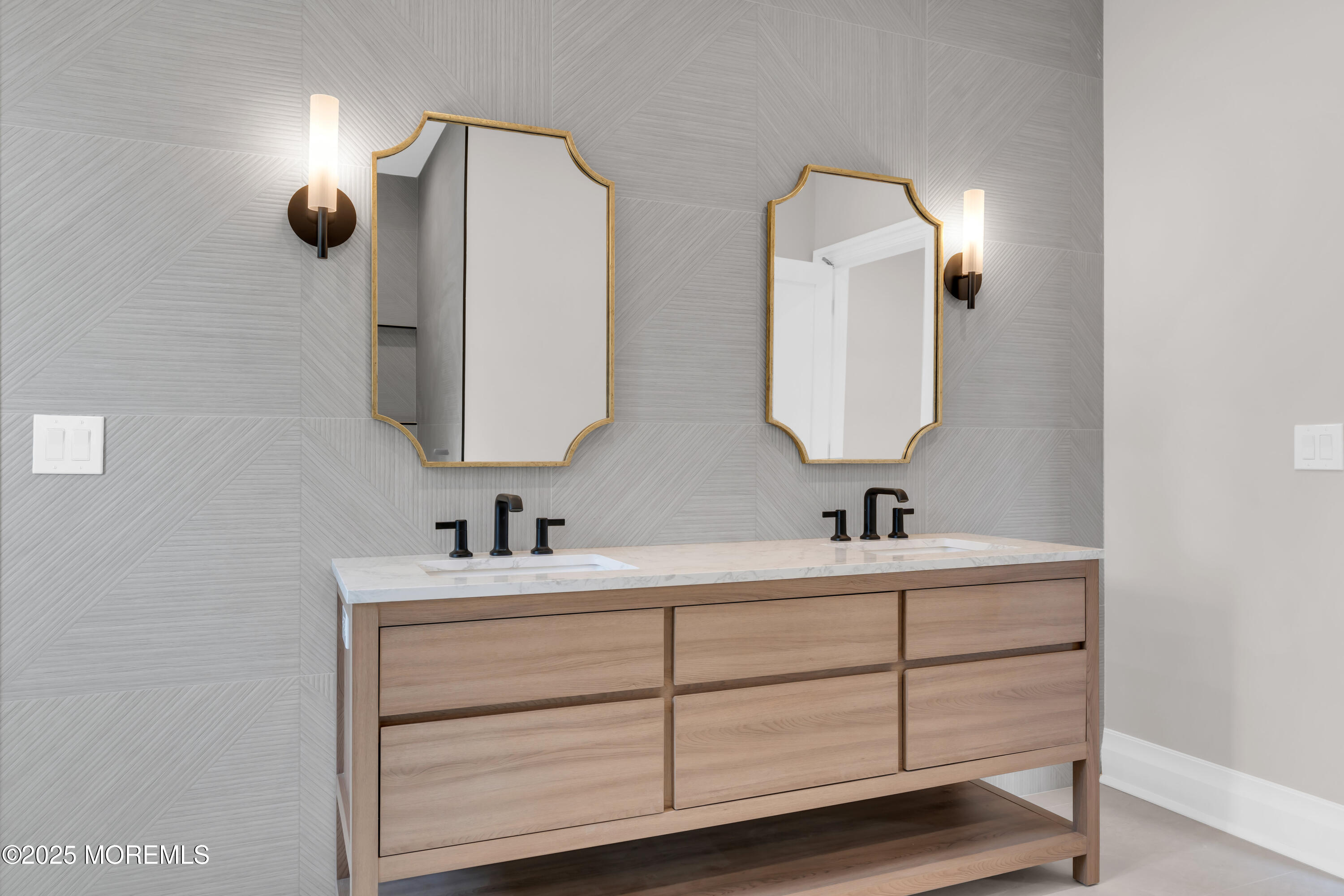 69 Winding Way Little Silver, NJ 07739 - Photo 77 of 99 a bathroom with a double vanity sink and mirror