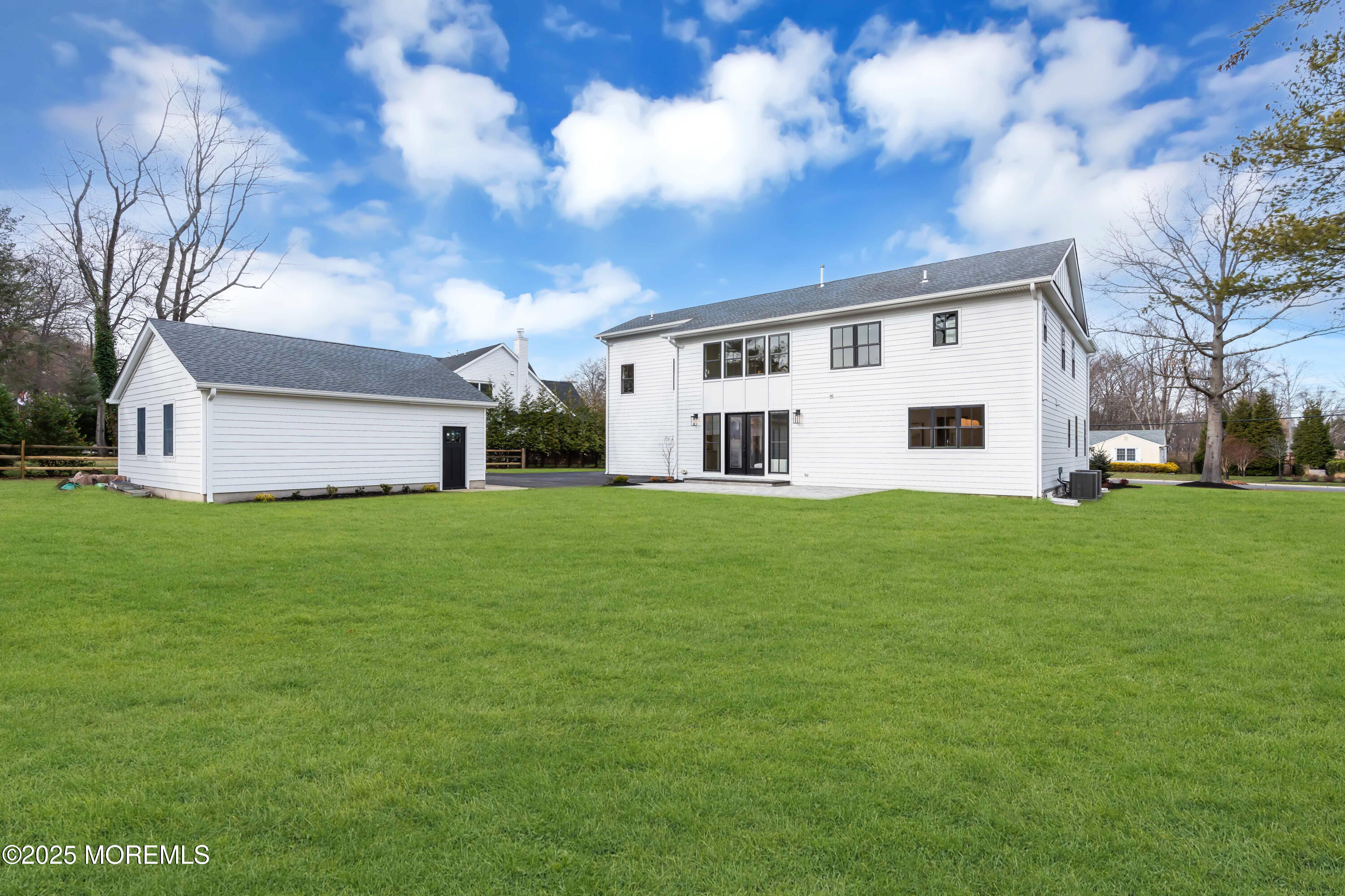 69 Winding Way Little Silver, NJ 07739 - Photo 90 of 99 a front view of house with yard and green space