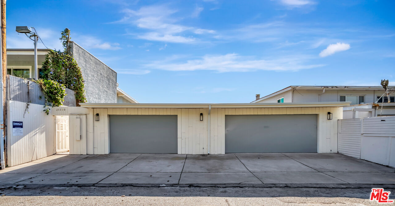 a view of a house with a garage