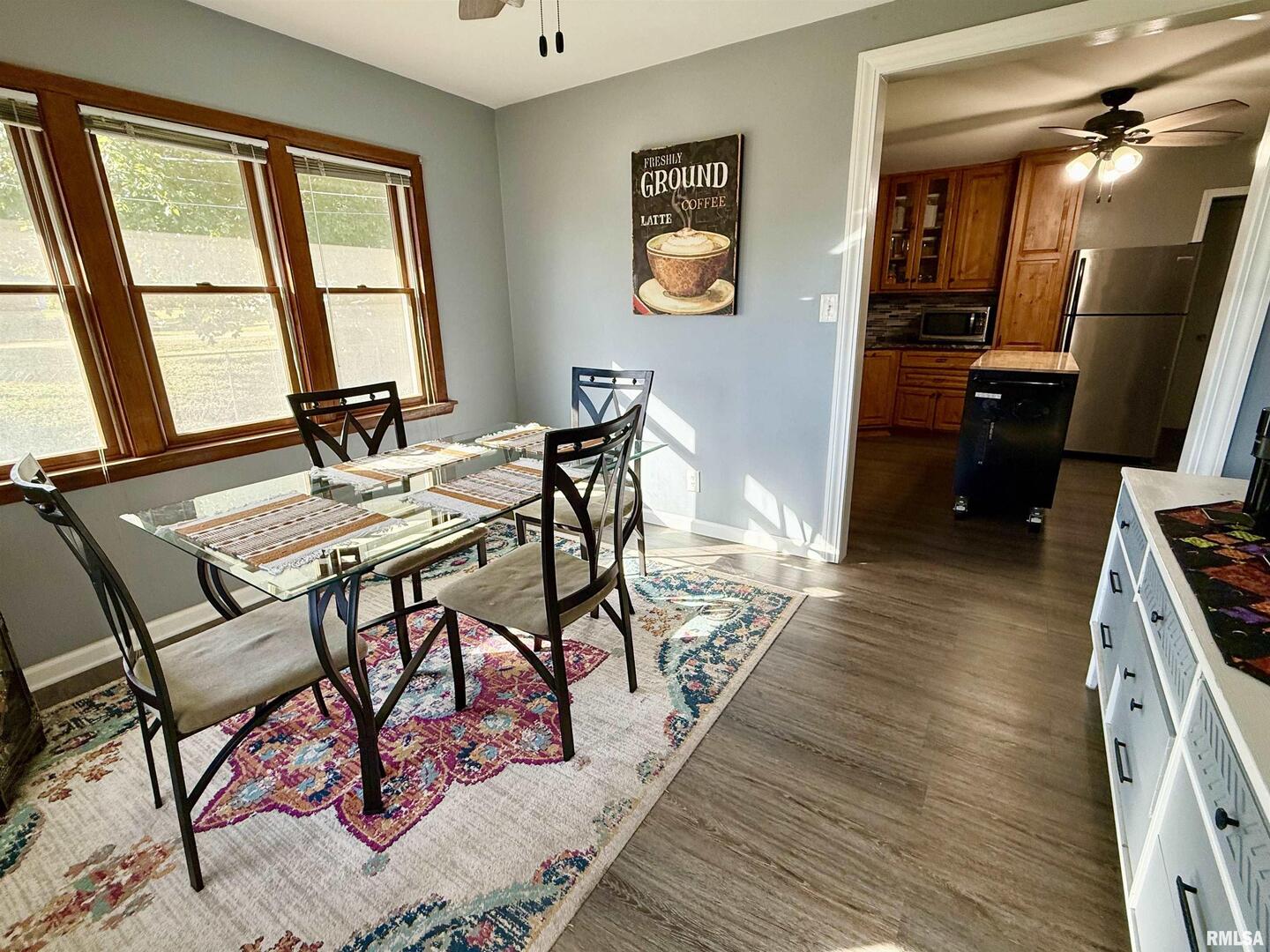 824 9th Avenue Fulton, IL 61252 - Photo 14 of 22 a view of a dining room with furniture and a window