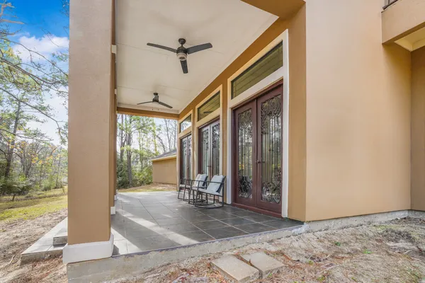 a view of a hallway with a livingroom