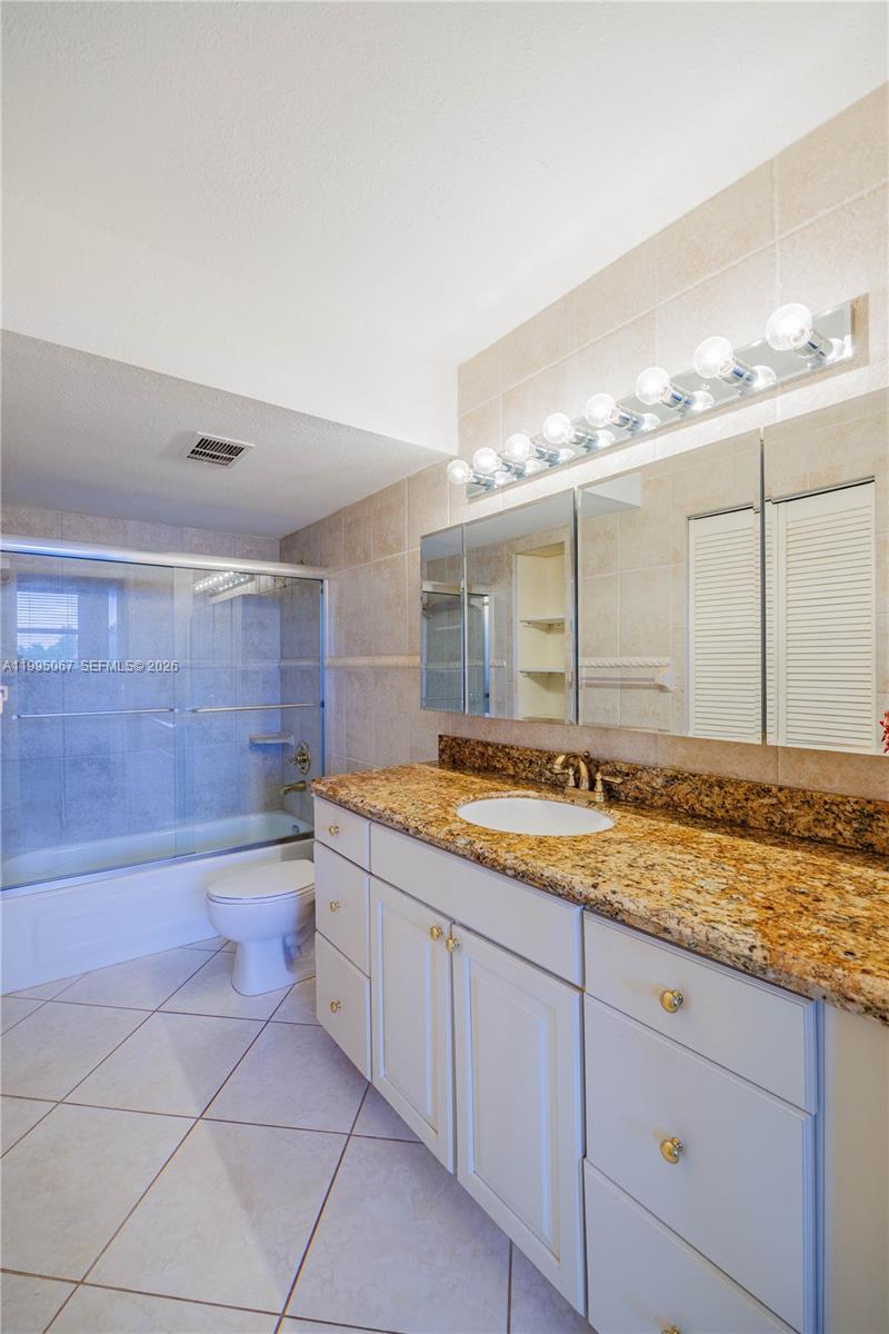 9150 Lime Bay Boulevard, Unit 110 Tamarac, FL 33321 - Photo 16 of 34 Master Bathroom