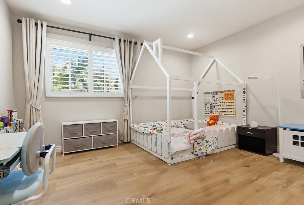 24303 East Rimford Place Diamond Bar, CA 91765 - Photo 20 of 39 a bedroom with bed and window