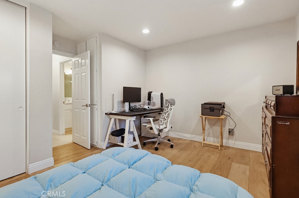 24303 East Rimford Place Diamond Bar, CA 91765 - Photo 26 of 39 a view of a livingroom with workspace and a window