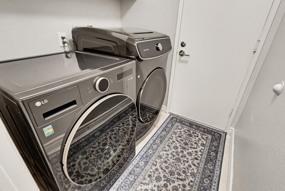 24303 East Rimford Place Diamond Bar, CA 91765 - Photo 30 of 39 a utility room with dryer and washer
