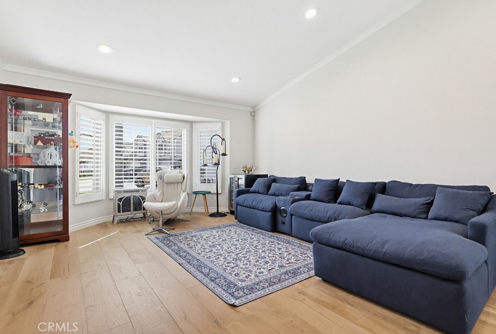 24303 East Rimford Place Diamond Bar, CA 91765 - Photo 4 of 39 a living room with furniture and a large window