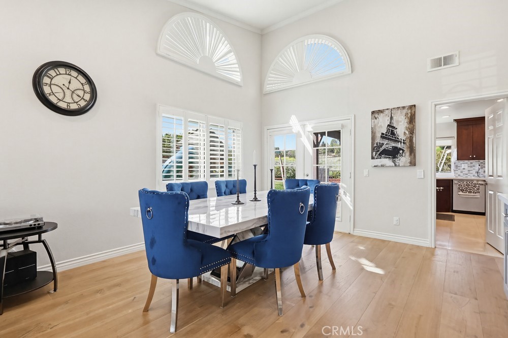 24303 East Rimford Place Diamond Bar, CA 91765 - Photo 5 of 39 a view of a livingroom with furniture a rug and a clock