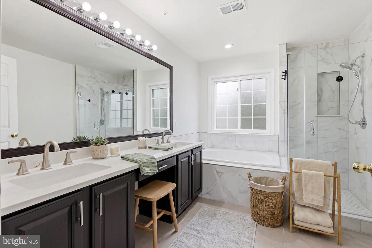 10003 Goose Pond Court Laurel, MD 20708 - Photo 24 of 50 Dual-vanity half bath