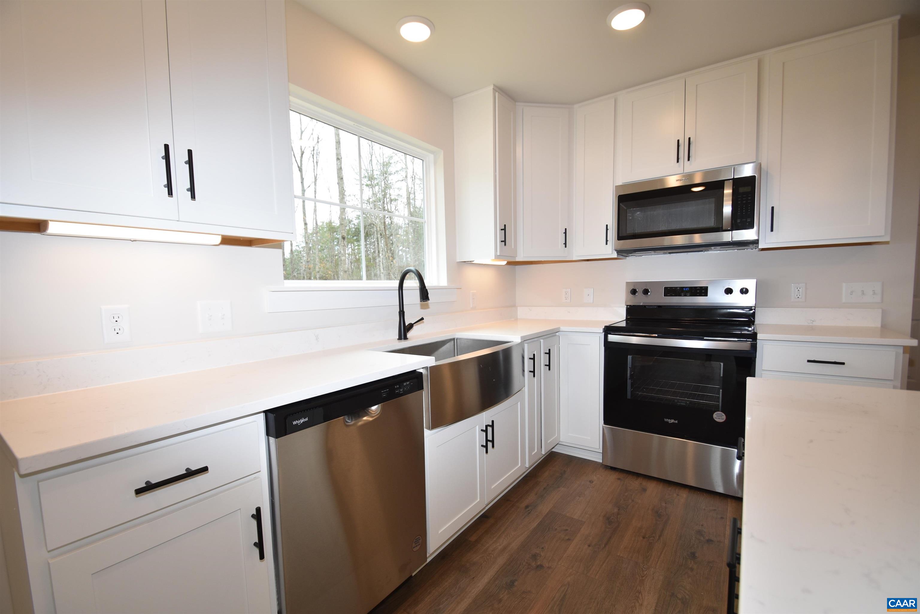 3 Chopt Road, Unit TC15B Kents Store, VA 23084 - Photo 12 of 33 a kitchen with a sink and steel appliances