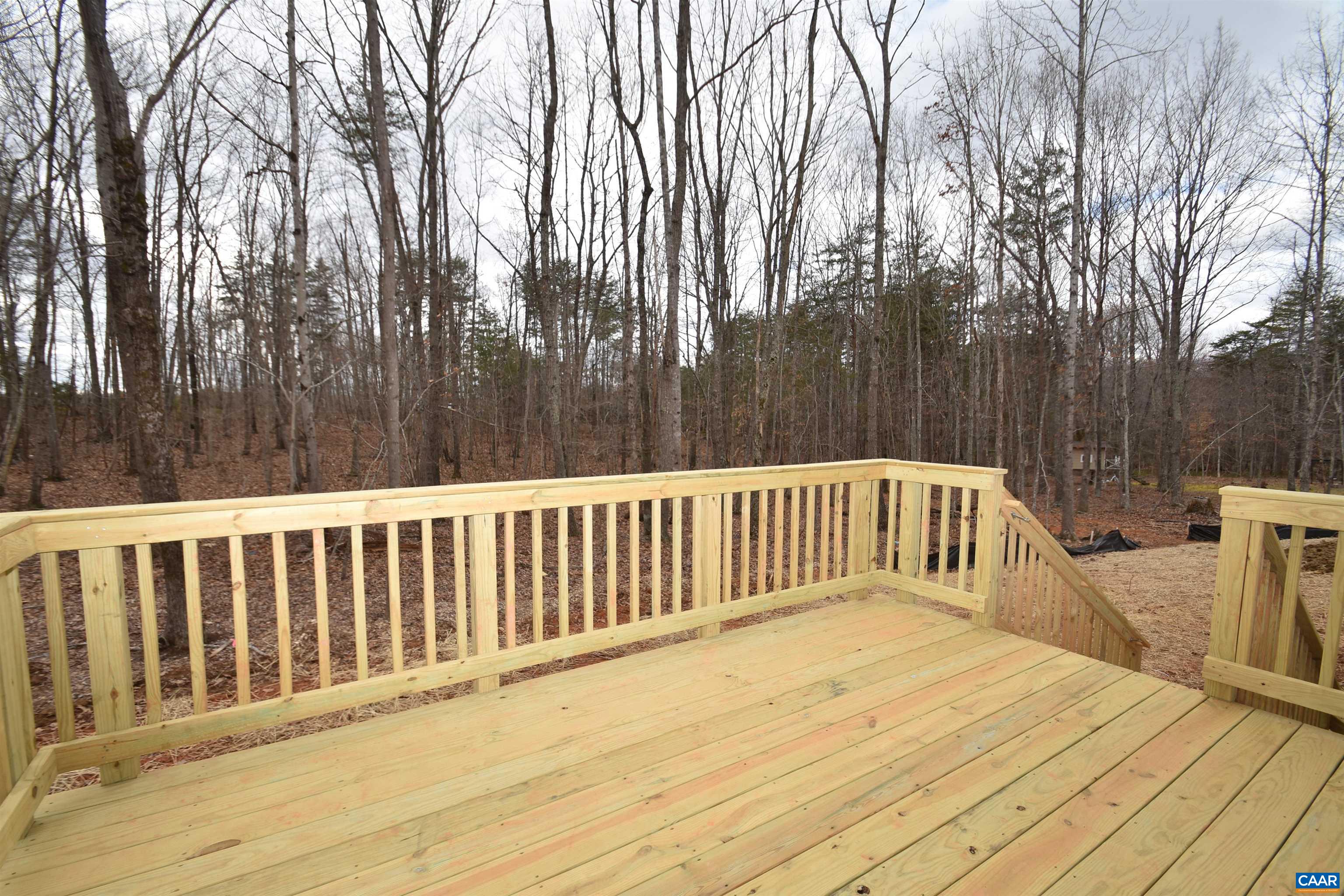 3 Chopt Road, Unit TC15B Kents Store, VA 23084 - Photo 14 of 33 a balcony with wooden floor and fence
