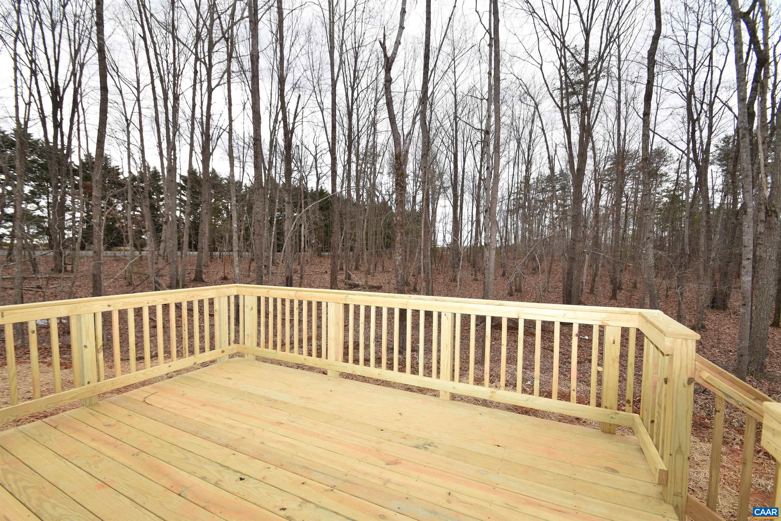3 Chopt Road, Unit TC15B Kents Store, VA 23084 - Photo 15 of 33 a view of wooden deck and trees
