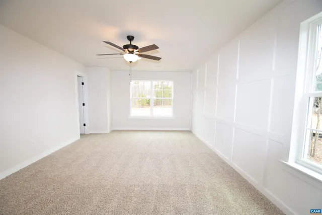 a bathroom with a sink double vanity and a mirror