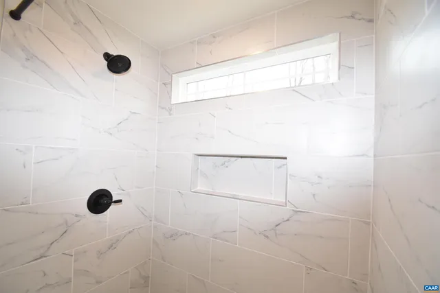 a view of a room with racks on the wall