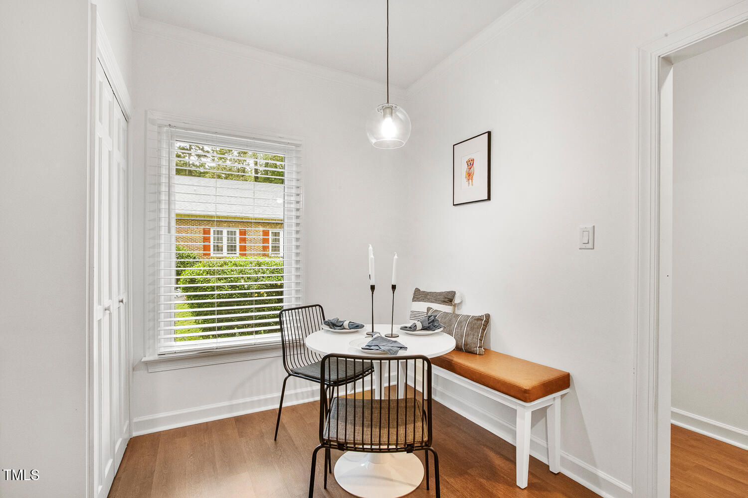 217 Danforth Drive Cary, NC 27511 - Photo 12 of 40 a view of a dining room with furniture window and wooden floor