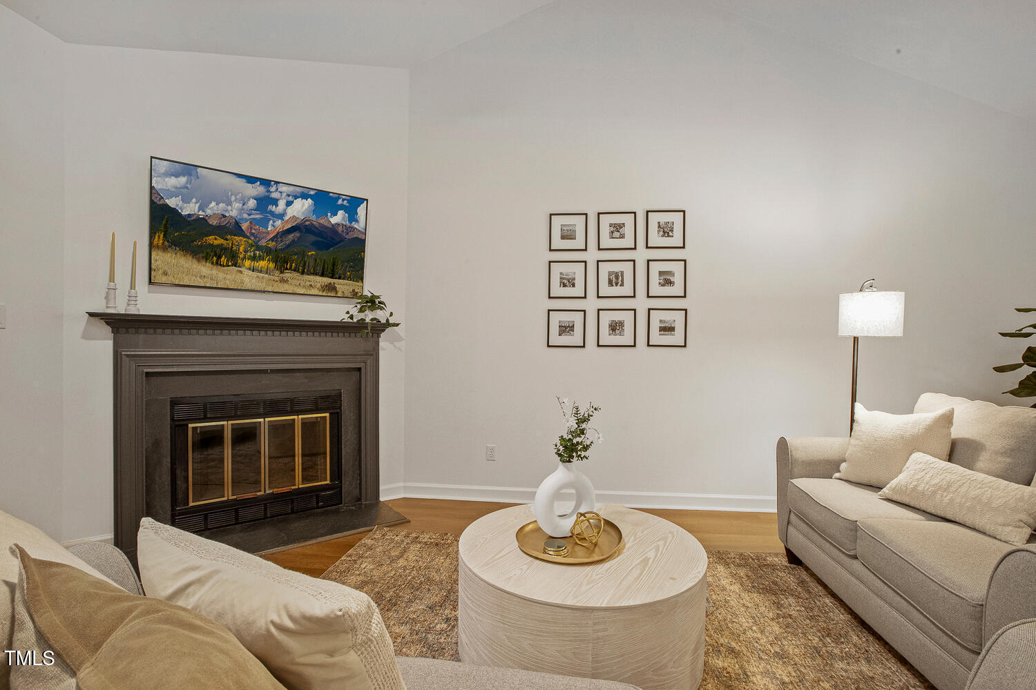 217 Danforth Drive Cary, NC 27511 - Photo 17 of 40 a living room with furniture and a fireplace