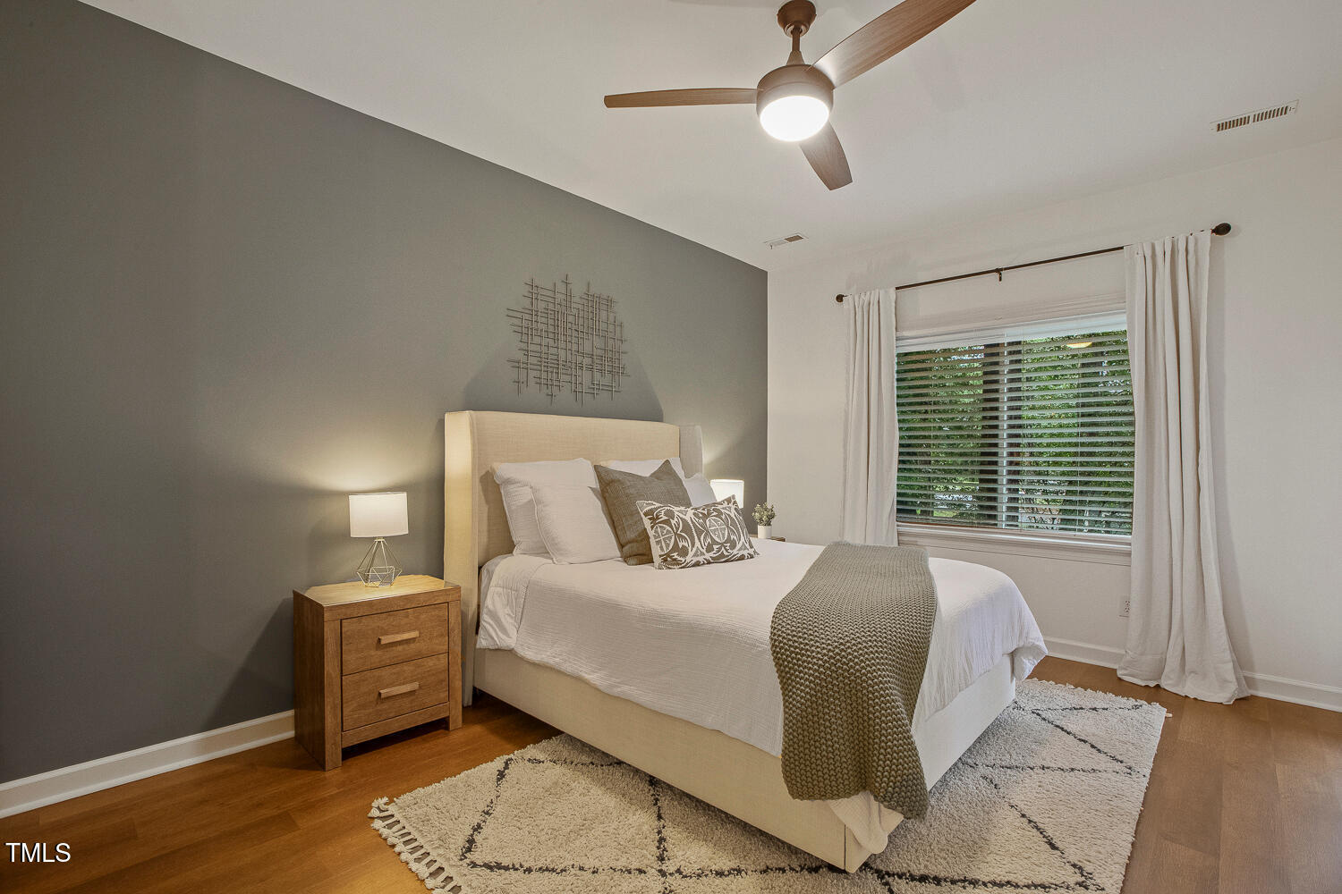 217 Danforth Drive Cary, NC 27511 - Photo 19 of 40 a bedroom with bed and window
