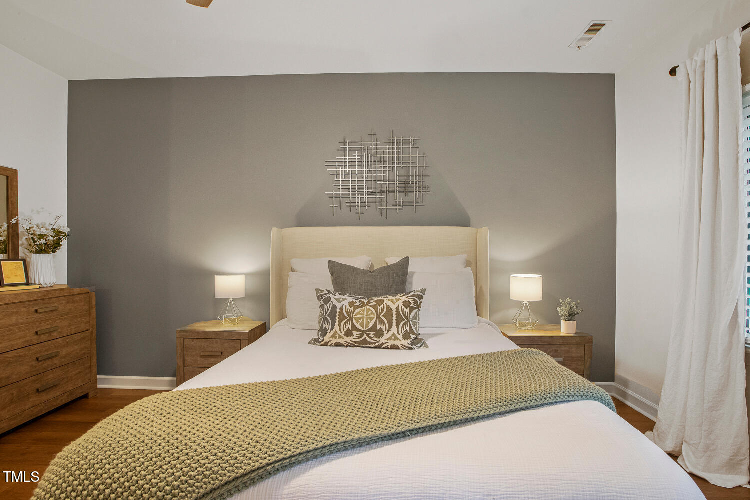 217 Danforth Drive Cary, NC 27511 - Photo 20 of 40 a bedroom with a bed and window