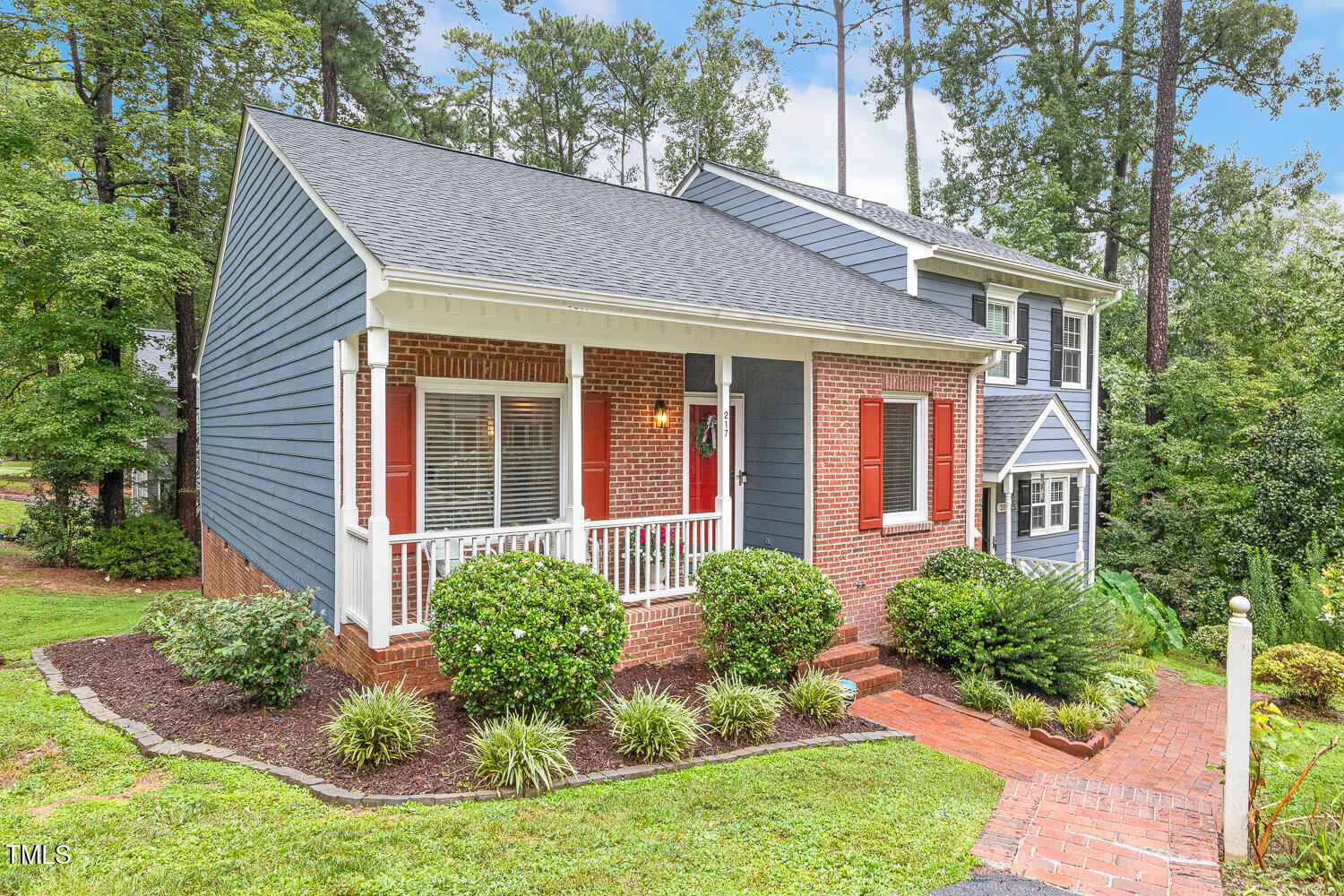 217 Danforth Drive Cary, NC 27511 - Photo 2 of 40 front view of a house with a yard