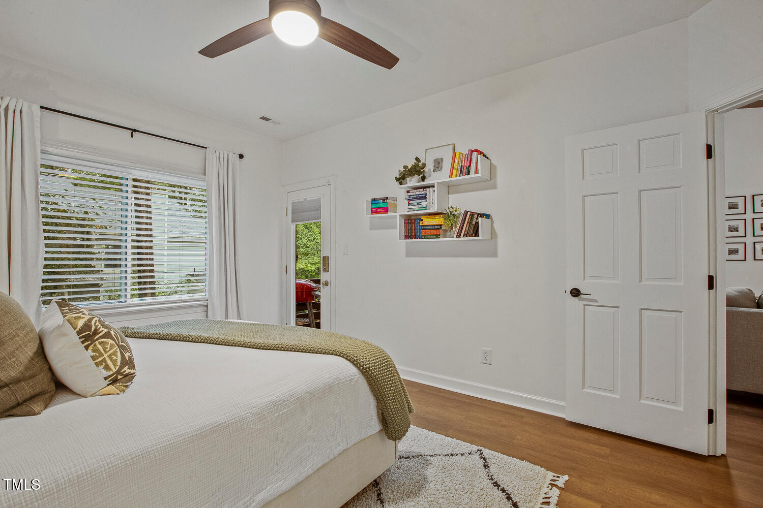217 Danforth Drive Cary, NC 27511 - Photo 23 of 40 a bedroom with a bed and a window