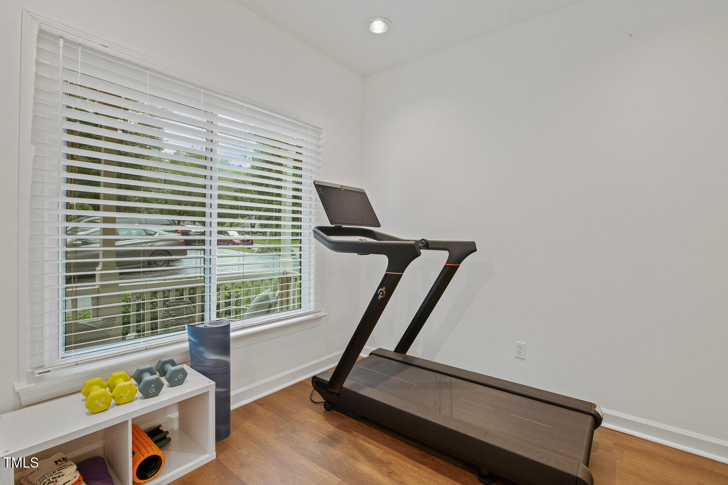 217 Danforth Drive Cary, NC 27511 - Photo 28 of 40 a view of a room with gym equipment