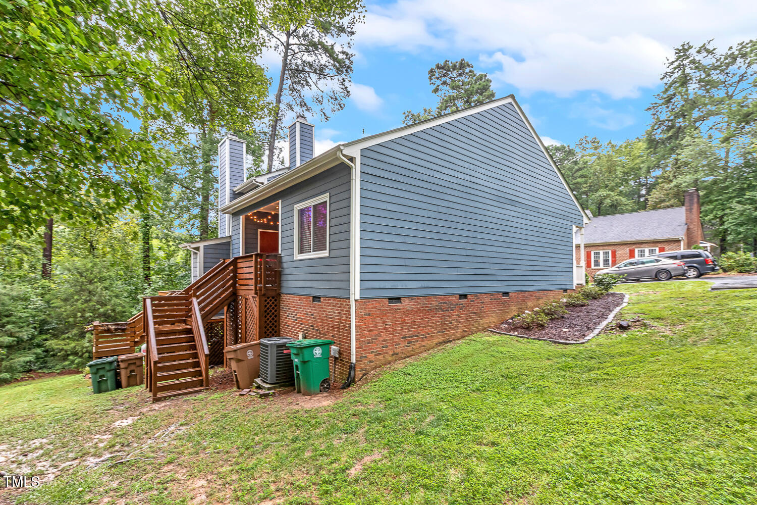 217 Danforth Drive Cary, NC 27511 - Photo 32 of 40 a view of a house with a yard