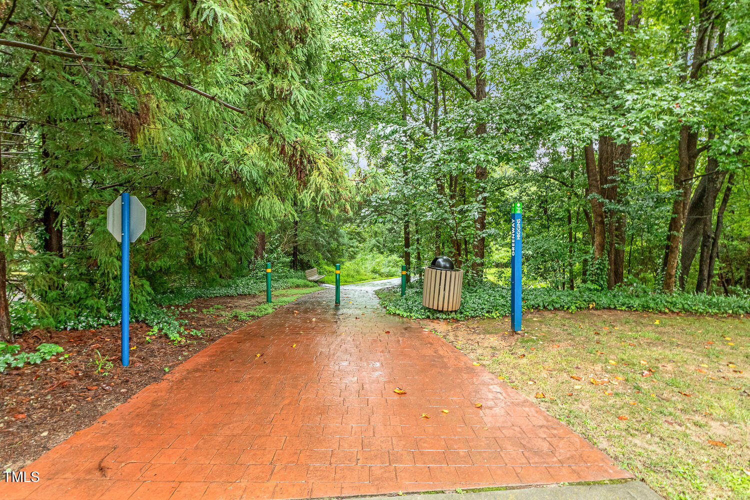 217 Danforth Drive Cary, NC 27511 - Photo 35 of 40 a wooden bench with view of trees