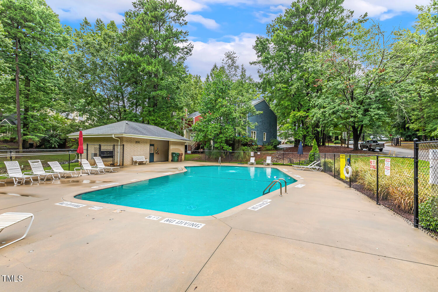 217 Danforth Drive Cary, NC 27511 - Photo 39 of 40 a view of a swimming pool with a patio