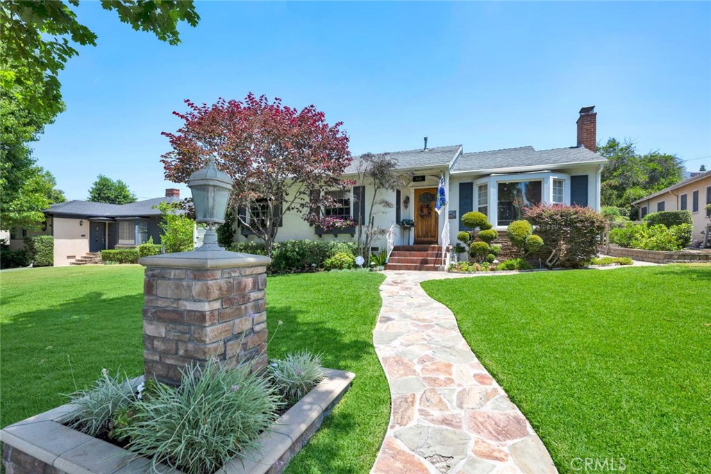 5456 Cadbury Road Whittier, CA 90601 - Photo 5 of 67 a front view of a house with garden