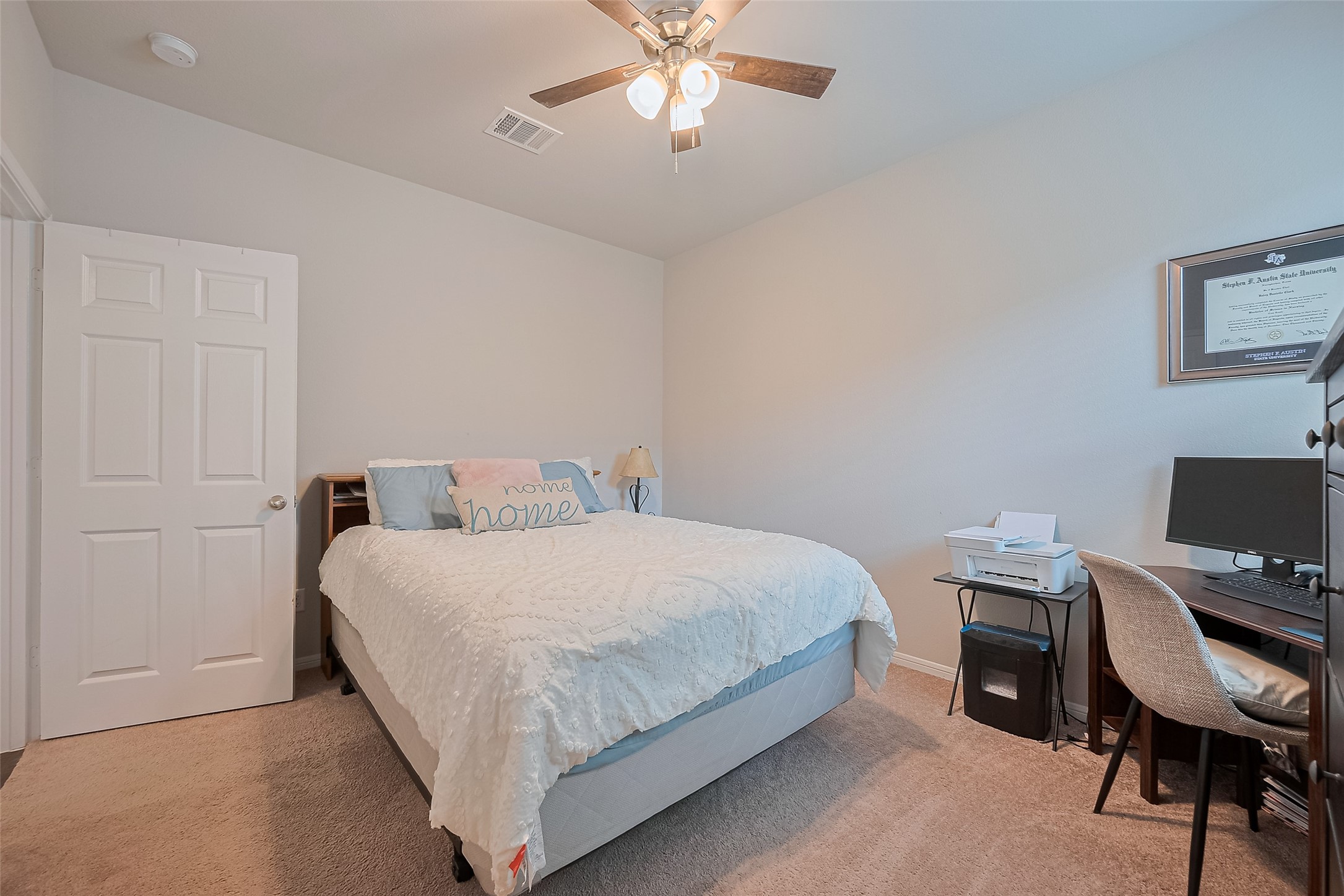 1214 Red Hills Drive Rosharon, TX 77583 - Photo 25 of 46 a bedroom with a bed a chair and a chandelier