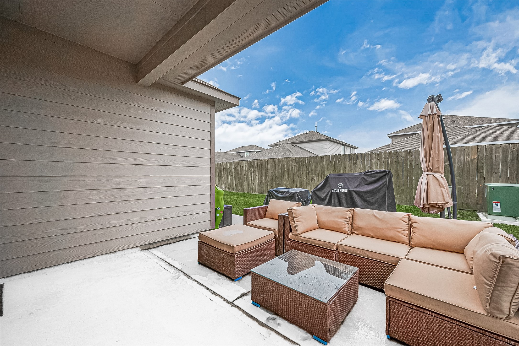 1214 Red Hills Drive Rosharon, TX 77583 - Photo 29 of 46 a outdoor living space with patio furniture and a potted plant