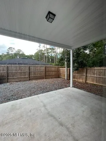 a view of outdoor space with fenced yard