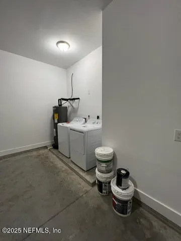 a white toilet sitting next to a bathroom sink