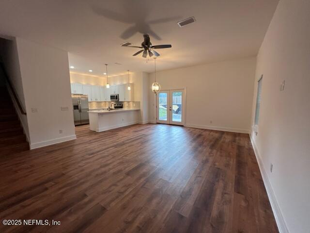 1335 Lemonwood Road St. Johns, FL 32259 - Photo 5 of 23 wooden floor in an empty room with a window