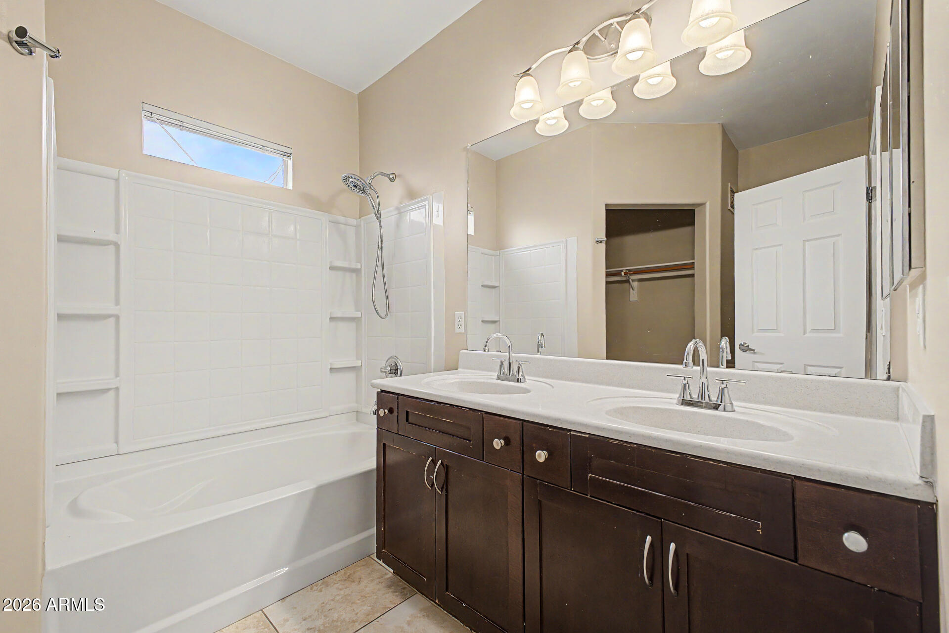 1920 East Bell Road, Unit 1173 Phoenix, AZ 85022 - Photo 13 of 33 a bathroom with a tub a sink double vanity and a mirror