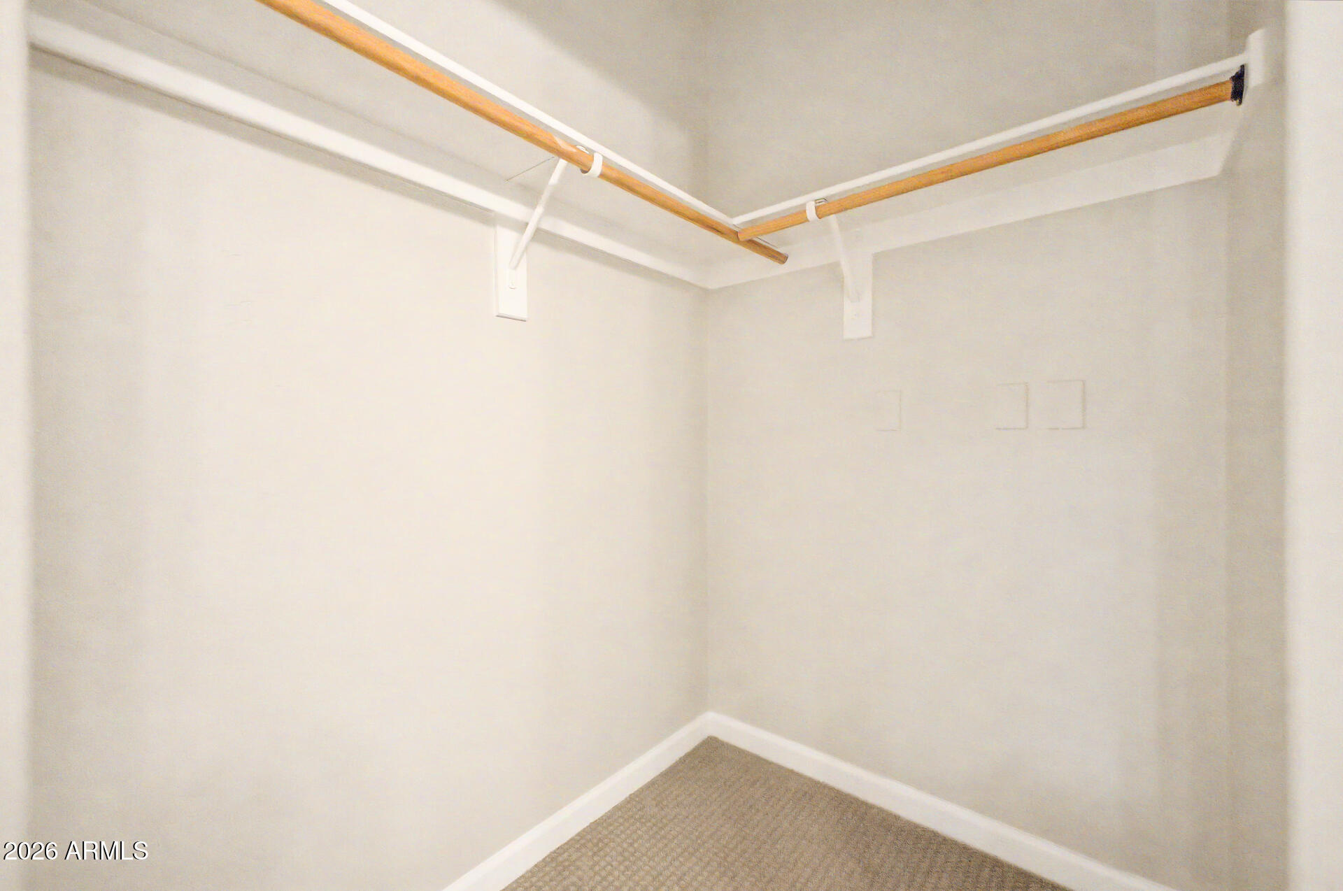1920 East Bell Road, Unit 1173 Phoenix, AZ 85022 - Photo 14 of 33 a view of an empty walk in closet