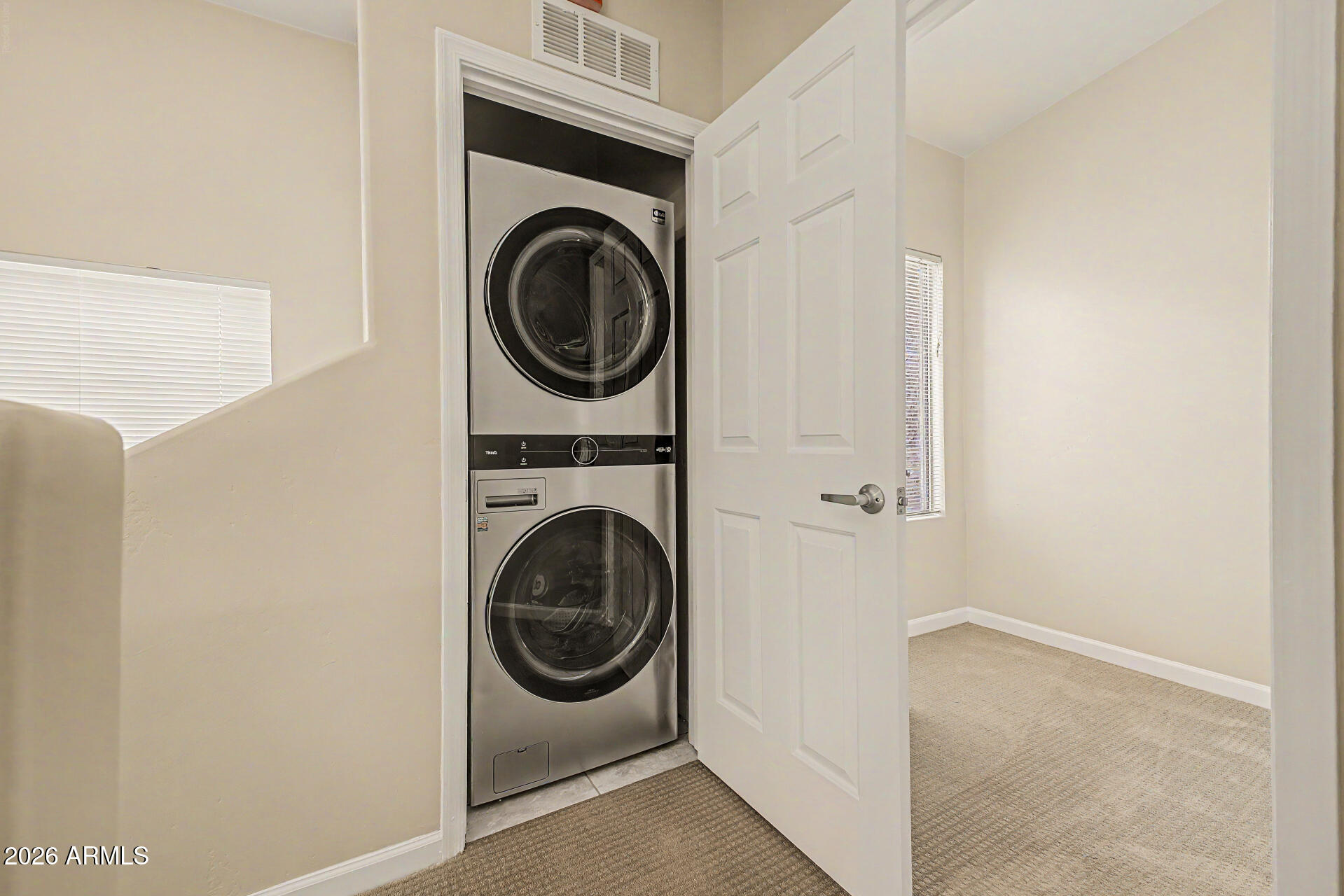 1920 East Bell Road, Unit 1173 Phoenix, AZ 85022 - Photo 16 of 33 a utility room with dryer and washer