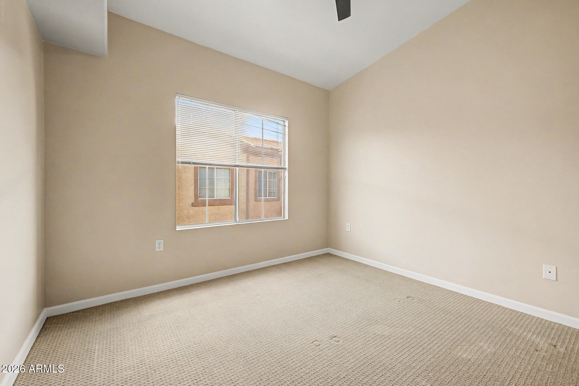 1920 East Bell Road, Unit 1173 Phoenix, AZ 85022 - Photo 17 of 33 a view of an empty room with a window