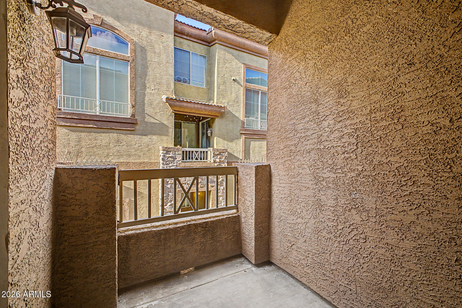 1920 East Bell Road, Unit 1173 Phoenix, AZ 85022 - Photo 21 of 33 a front view of a house with parking space
