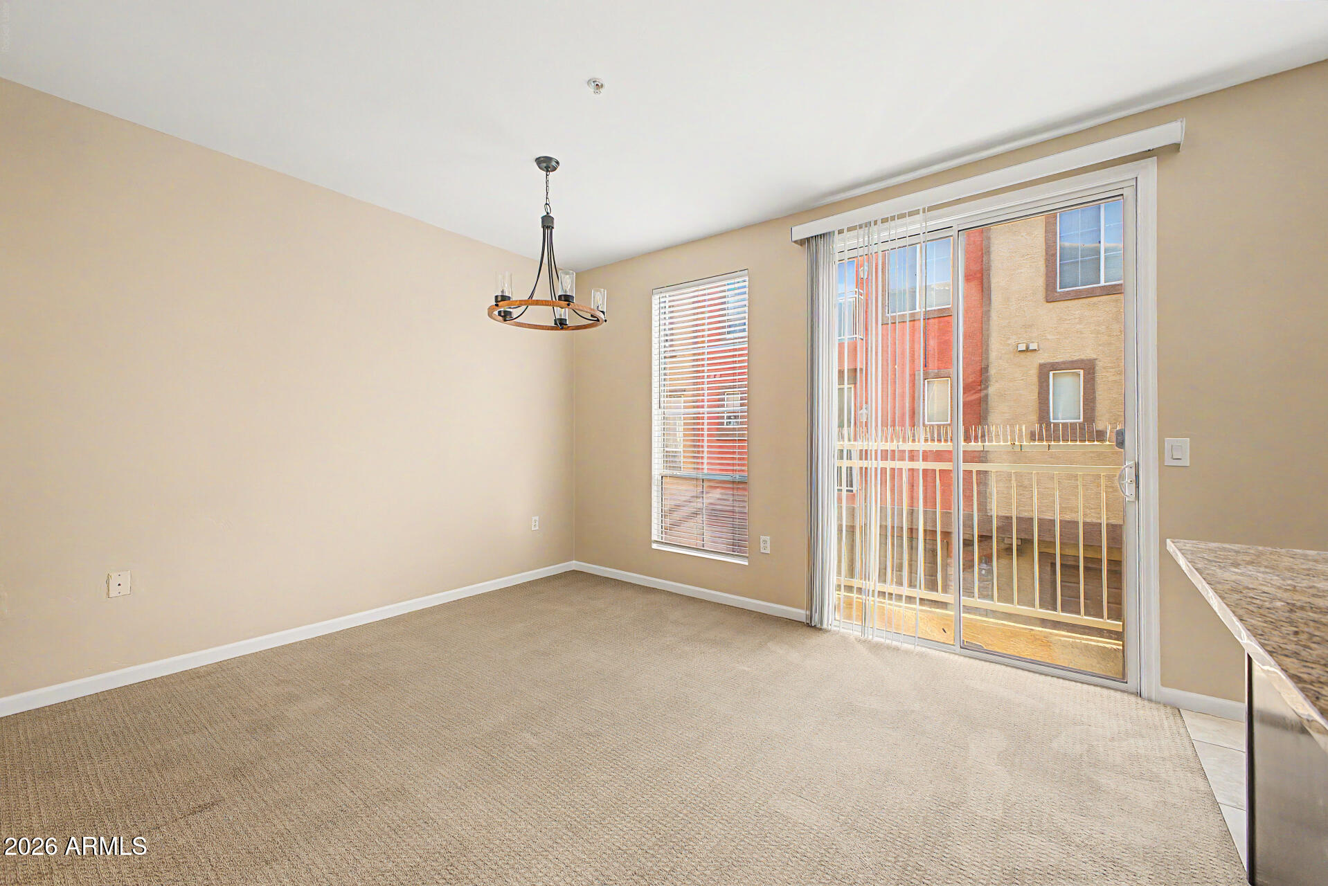 1920 East Bell Road, Unit 1173 Phoenix, AZ 85022 - Photo 4 of 33 a view of an empty room with a window