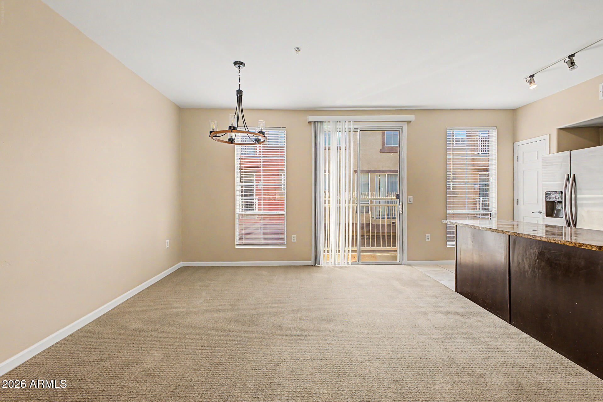 1920 East Bell Road, Unit 1173 Phoenix, AZ 85022 - Photo 5 of 33 a view of an empty room with a window