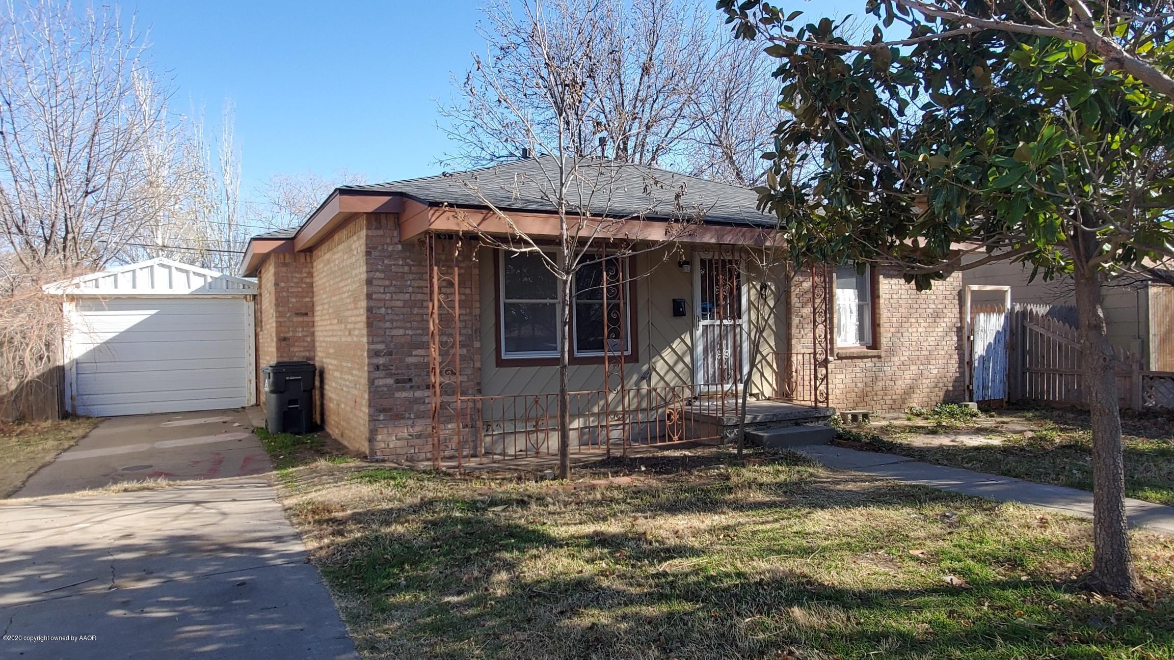3809 South Jackson Street Amarillo, TX 79110 - Photo 17 of 17 a front view of a house with garden