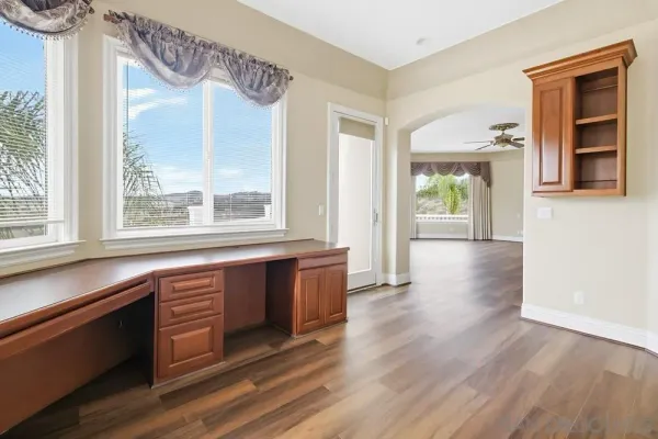 a bathroom with a shower and a window