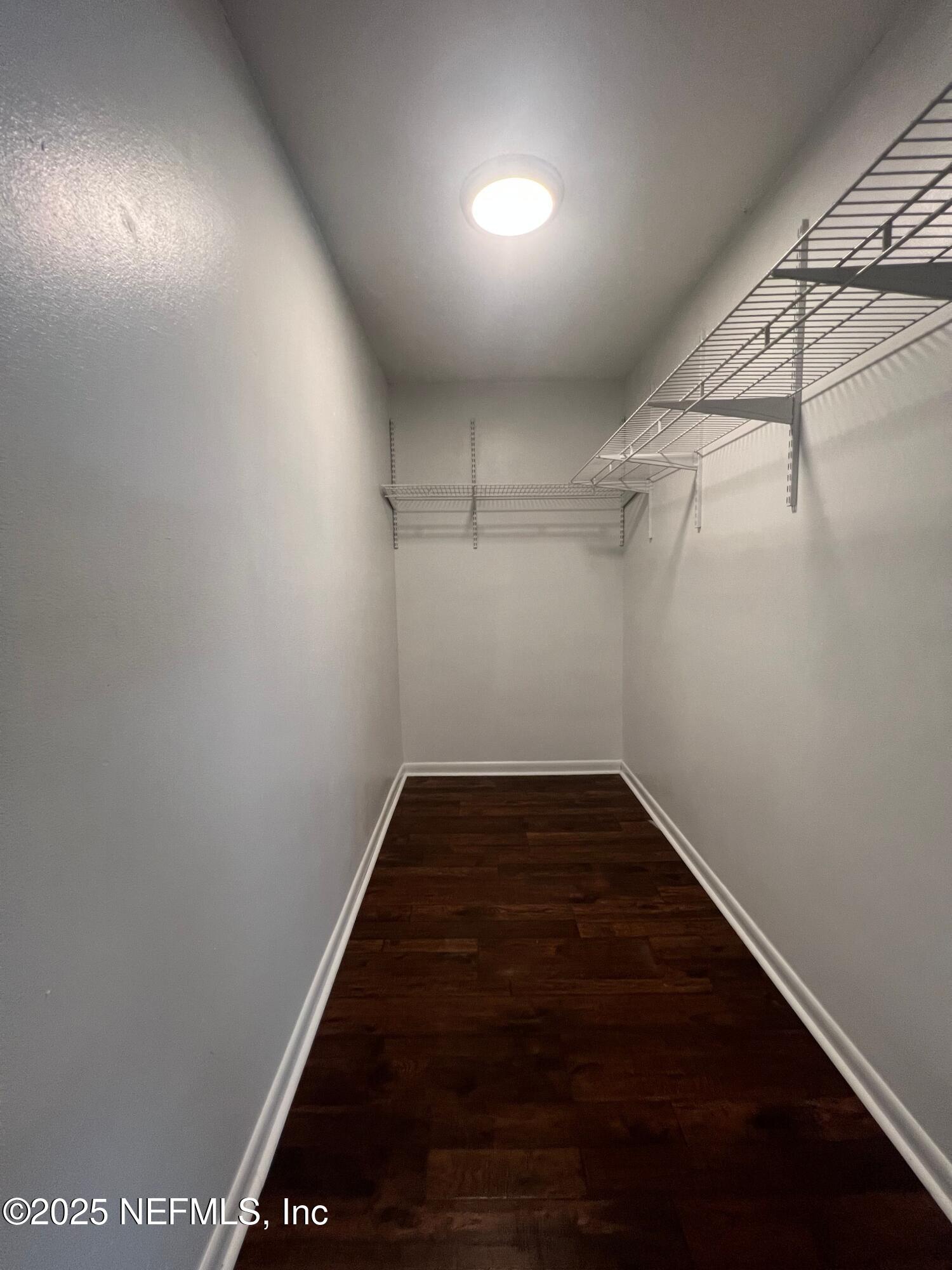 1508 Center Street Green Cove Springs, FL 32043 - Photo 16 of 24 a view of a room with racks on the wall