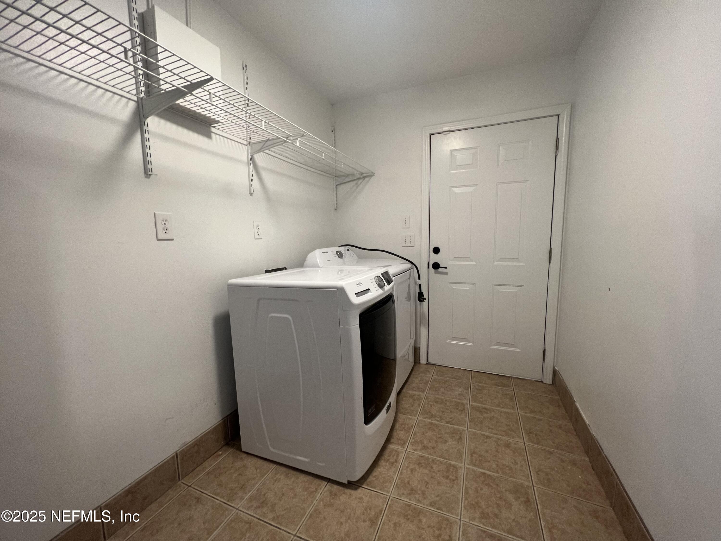 1508 Center Street Green Cove Springs, FL 32043 - Photo 20 of 24 a utility room with dryer and washer