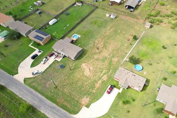 an aerial view of a swimming pool